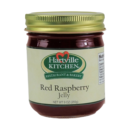 Jar of smooth red raspberry jelly with gold lid from Hartville Kitchen for jams and jellies collection under $25