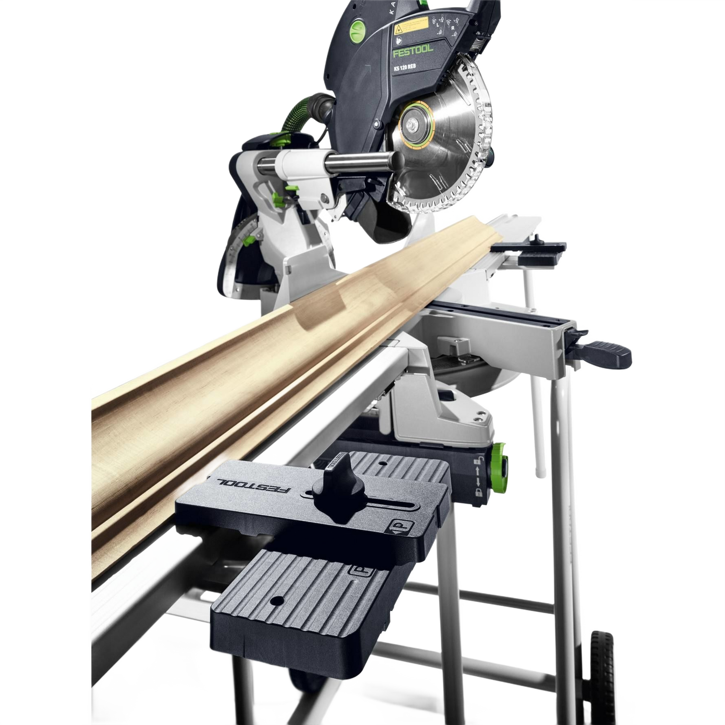 Festool Kapex sliding compound miter saw with crown stops supporting angled molding on saw accessories and tool stand