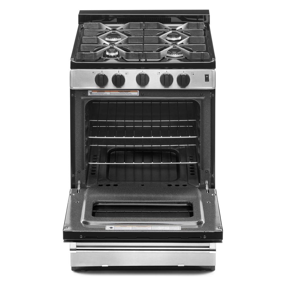 Compact freestanding gas range with four sealed burners and open oven door showing racks and drip pan