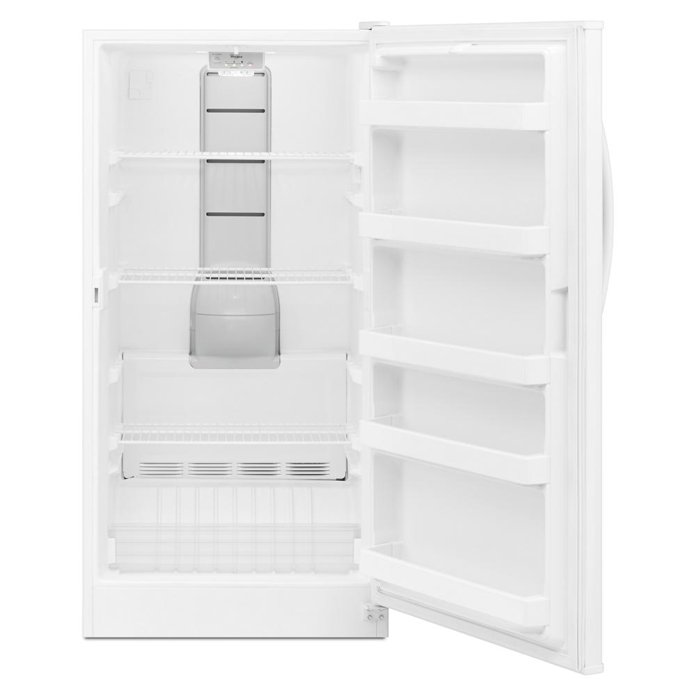 White upright freezer with open door, wire shelving, and interior compartments in freezers and kitchenware collection