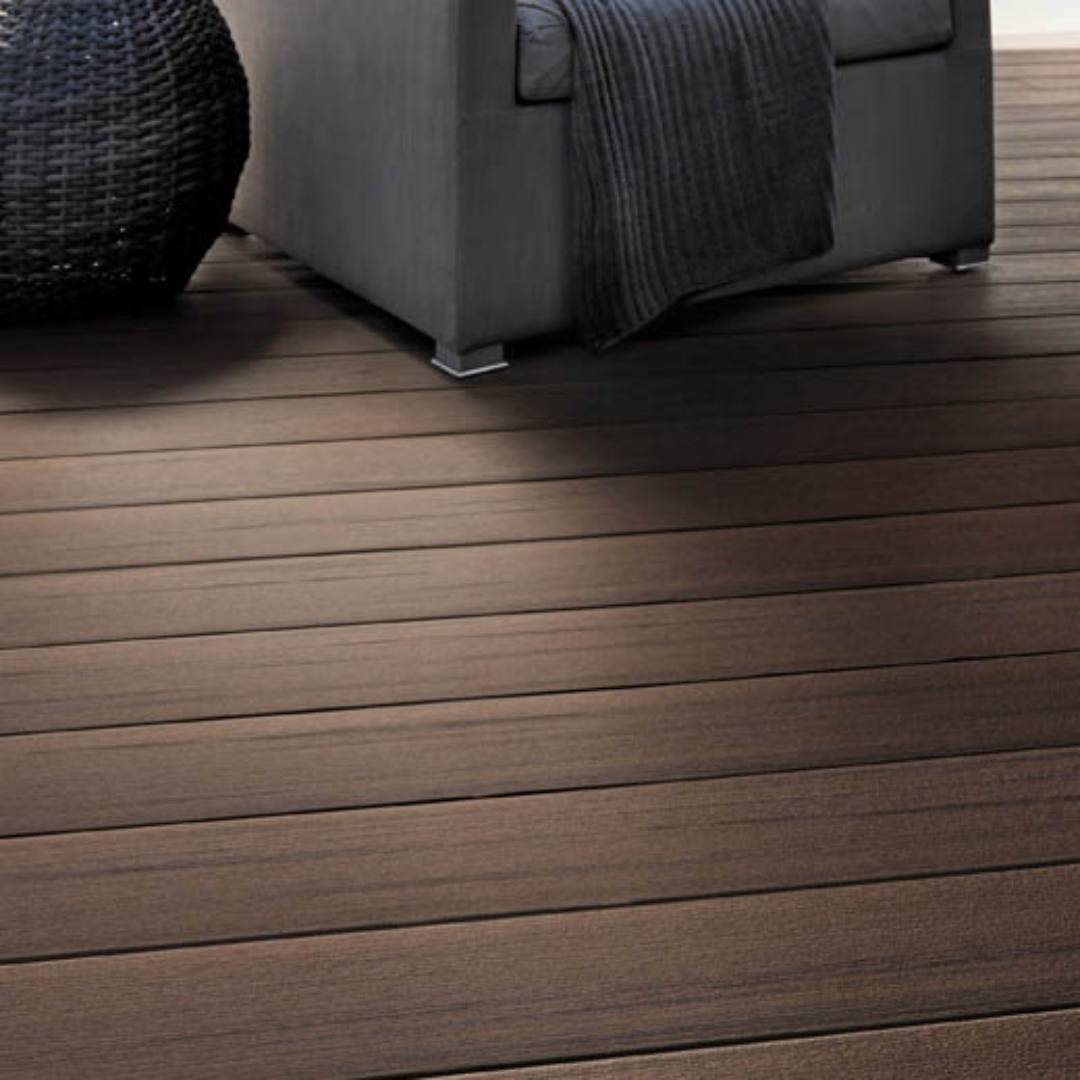 Grooved composite deck boards in rich Dark Cocoa color from Prime+ Collection, ideal for durable outdoor decking projects