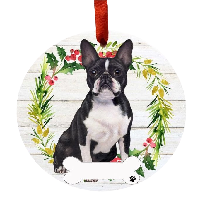 Round ornament showing a Boston Terrier inside a festive green and red berry wreath with red hanging ribbon