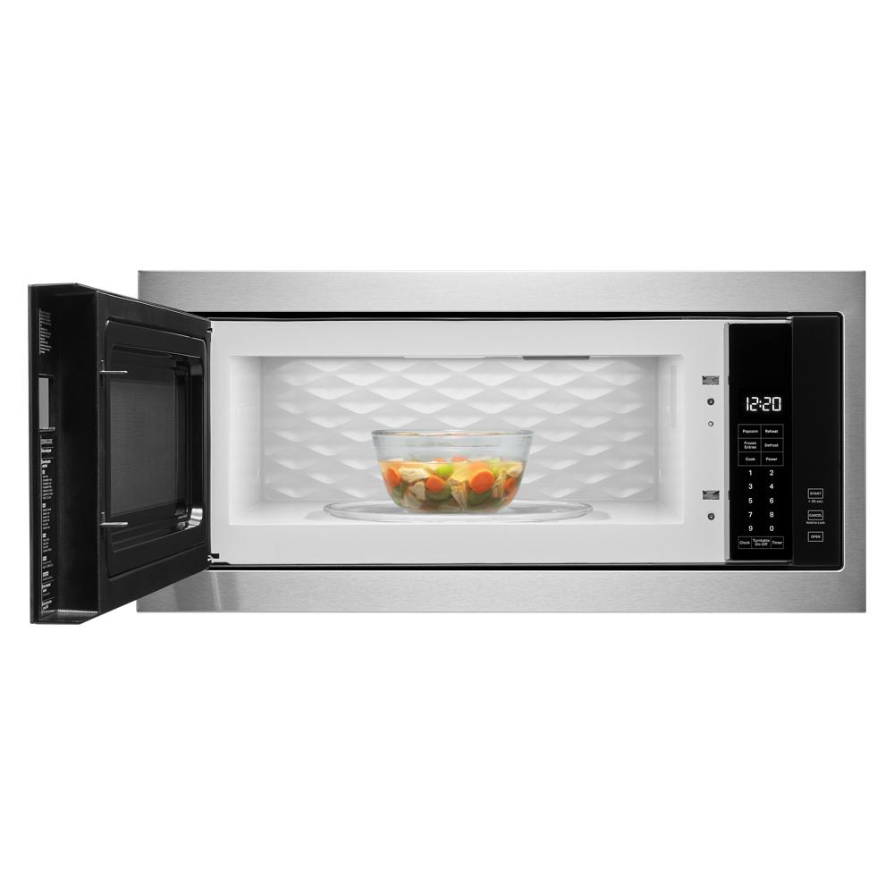 Stainless steel built-in microwave with slim trim and digital control panel showing vegetable bowl inside from Kitchen & Kitchenware
