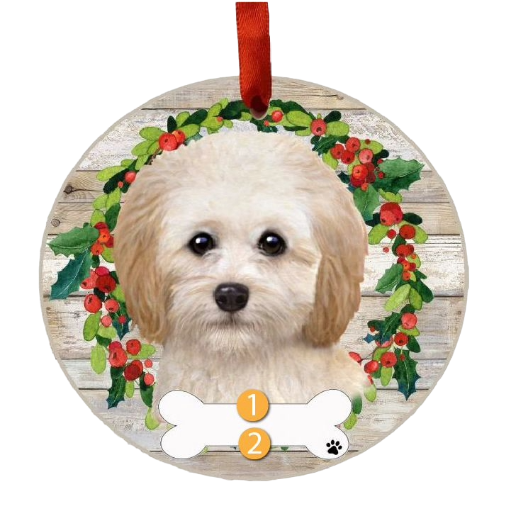 Round Christmas ornament featuring a personalized Cockapoo face framed by festive holly wreath and red ribbon hanger