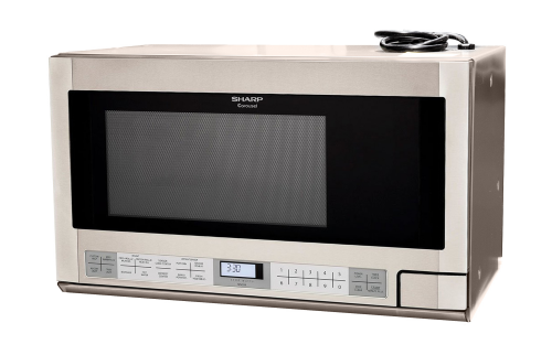 Stainless steel over-the-counter carousel microwave with digital display and hidden Auto-Touch controls in kitchen appliances collection