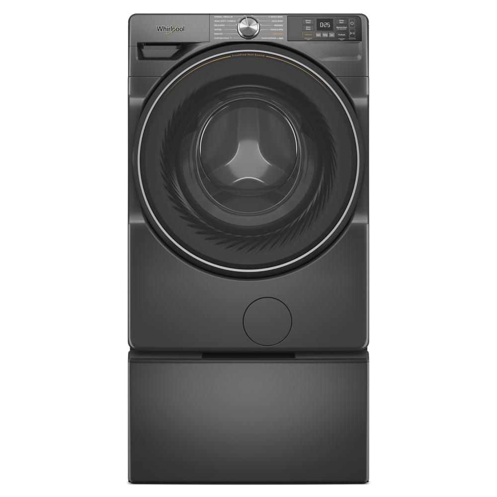 Front load washer in dark gray with matching laundry pedestal for added storage and raised laundry access