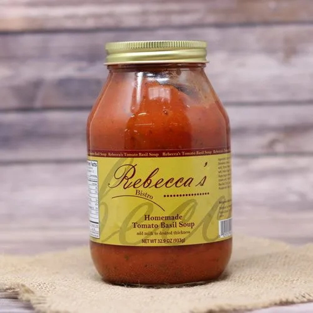 Glass jar of homemade tomato basil soup with yellow label and gold lid in food and beverage under $50 collection