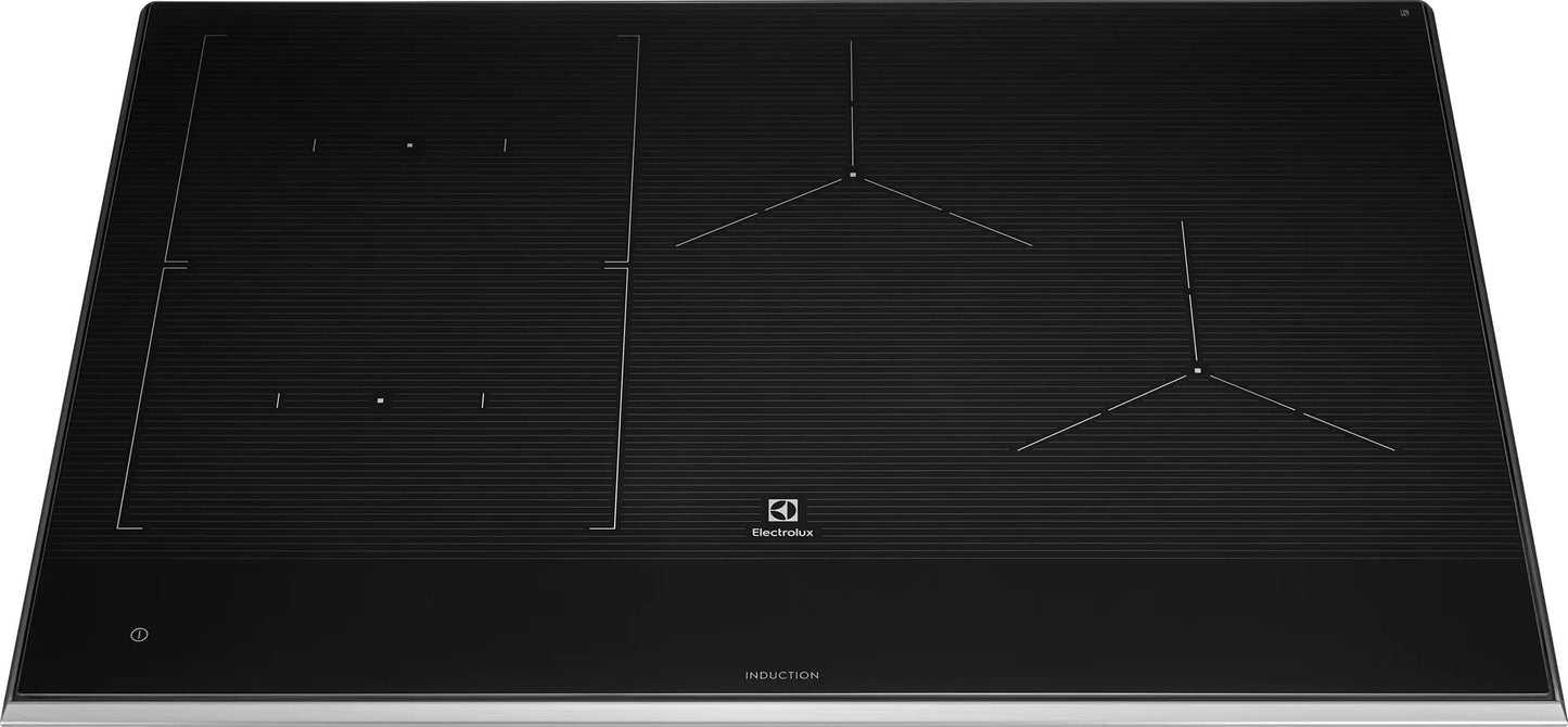 Black Electrolux induction cooktop with three heating zones and sleek minimalist design in kitchen appliances collections