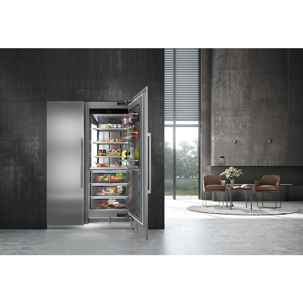 Open built-in stainless steel upright freezer with clear shelves and storage drawers in modern kitchen appliances collection
