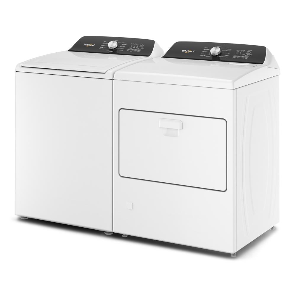 Pair of white top load washing machine and gas dryer with digital controls in modern laundry appliance setup