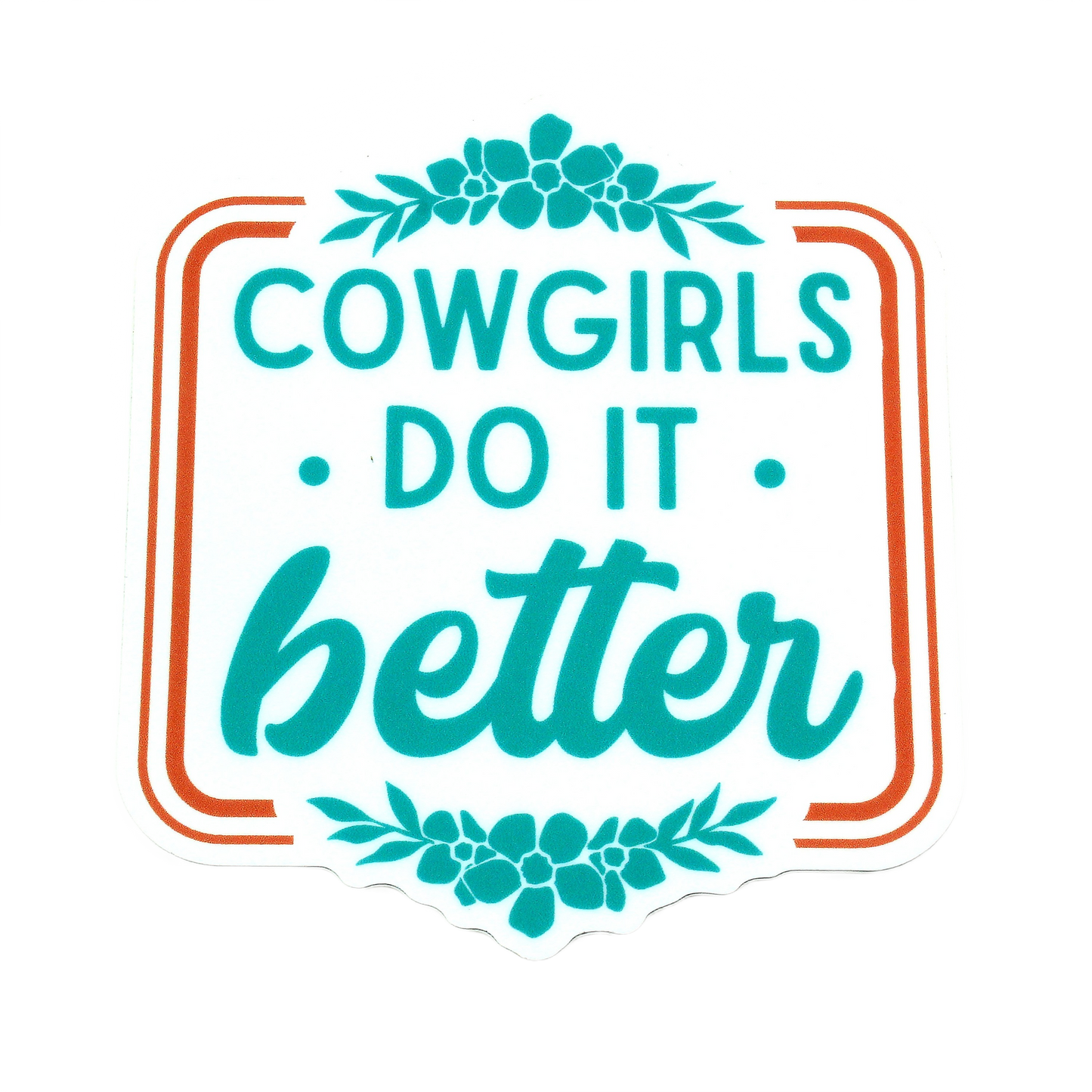 Square sticker with teal text saying "Cowgirls do it better" accented by floral designs and framed with orange lines