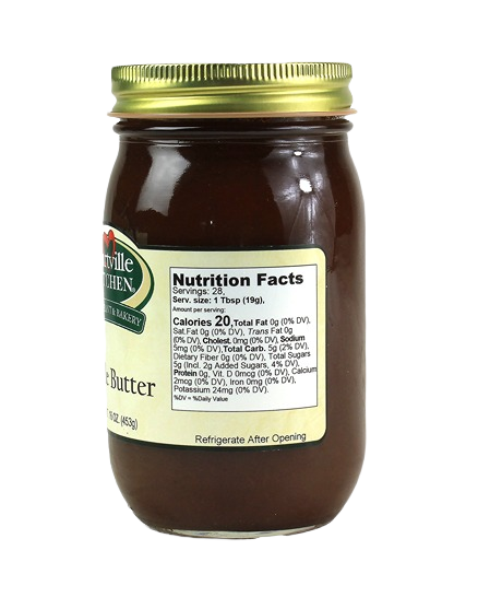Jar of smooth apple butter with gold lid and visible nutrition facts label from jams and jellies collection