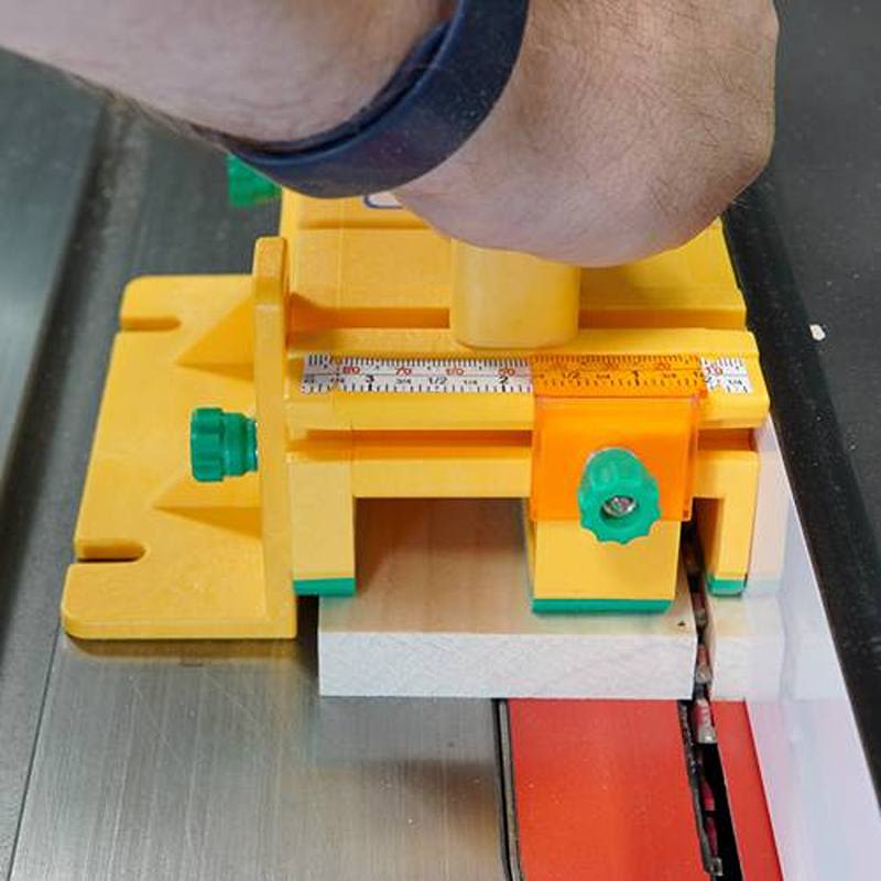 Yellow and green adjustable safety push block for precise wood cutting on table saws in tool and power tool accessories collections