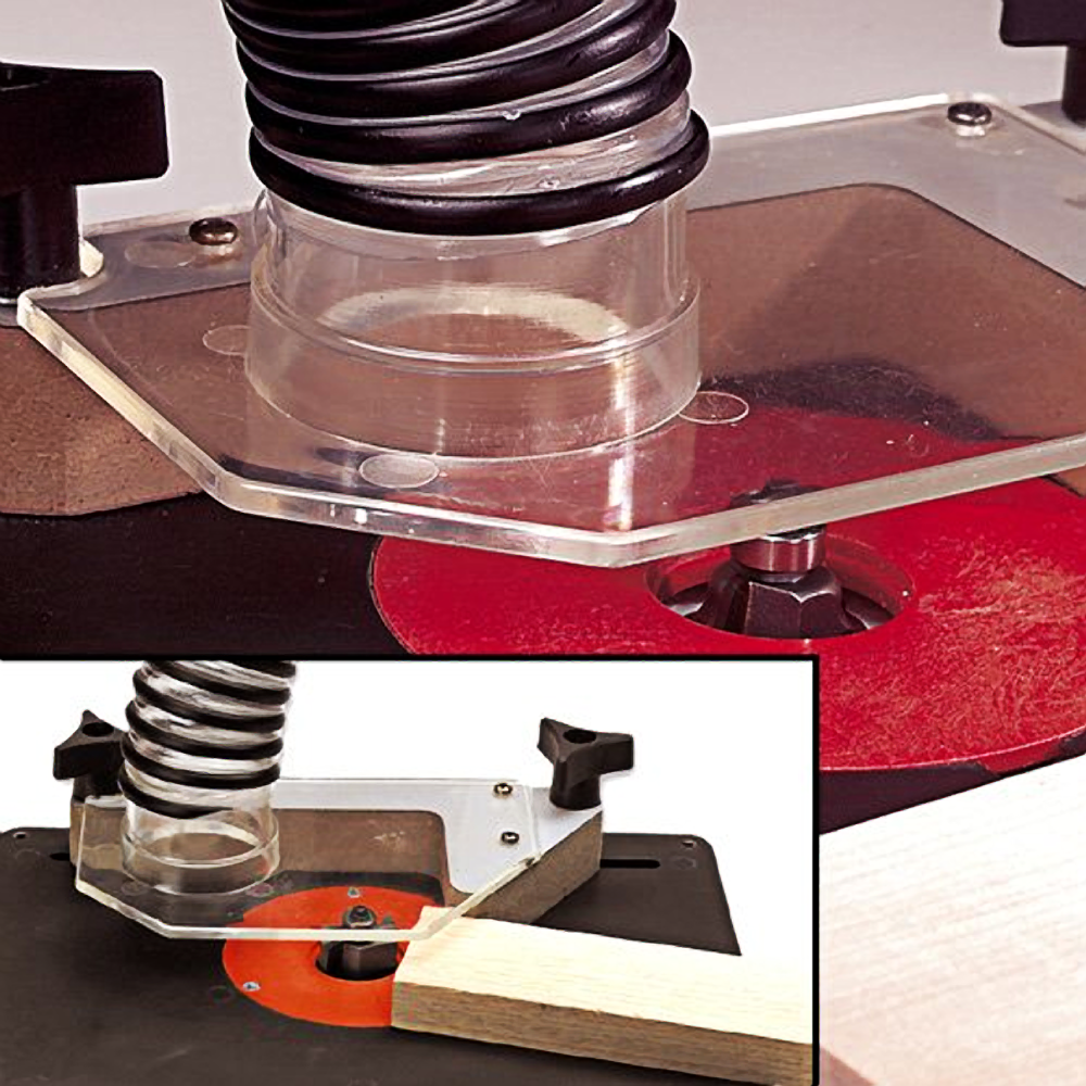 Clear acrylic router bit guard with black vacuum attachment and red router plate in tool accessories collection
