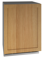 Undercounter beverage center with natural wood-paneled door and stainless steel base in kitchen appliance setting