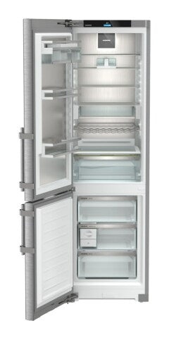 Open freestanding stainless steel refrigerator and bottom freezer with illuminated interior in Refrigerators and Kitchen & Kitchenware collections