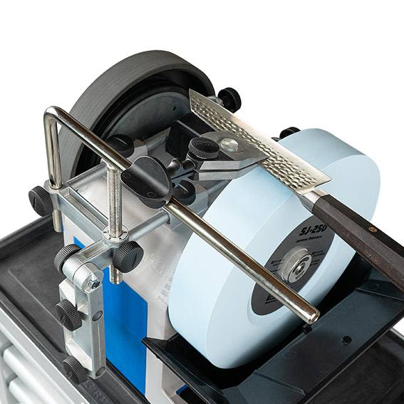 Metal multi base attachment with adjustable clamps and black knobs for sharpening tools in home improvement tasks
