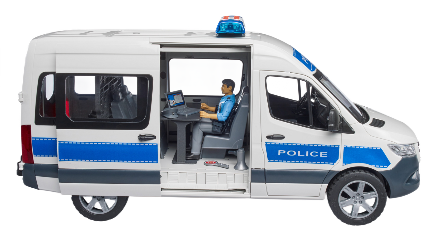 White and blue police emergency van toy with detailed interior and figure driving at computer station