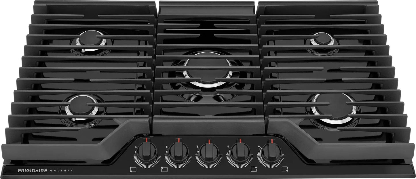 Modern black 36-inch gas cooktop with five burners and control knobs in kitchen appliances and cooktops collection