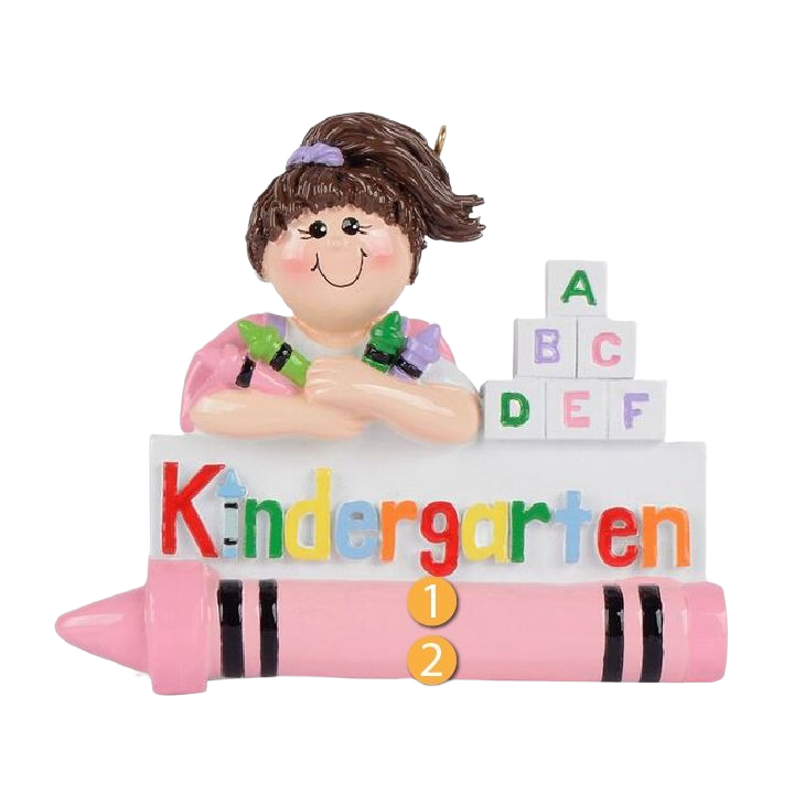 Girl with pigtails leaning on colorful Kindergarten sign with pink crayon and alphabet blocks Christmas ornament under $50
