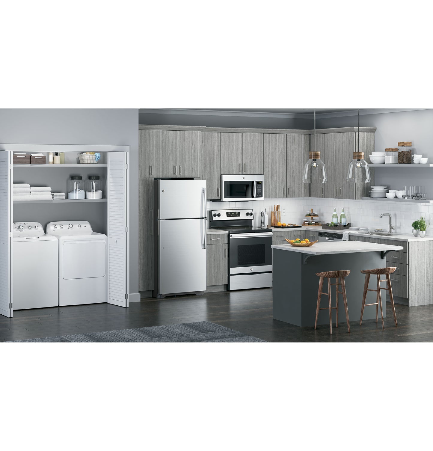 Modern kitchen with gray wood cabinetry, stainless steel refrigerator, stove, over-the-range microwave, and island with wooden stools