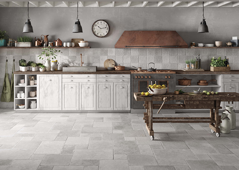 Modern kitchen scene with matte porcelain tile flooring in neutral tones, rustic table, and light wood cabinetry for home improvement