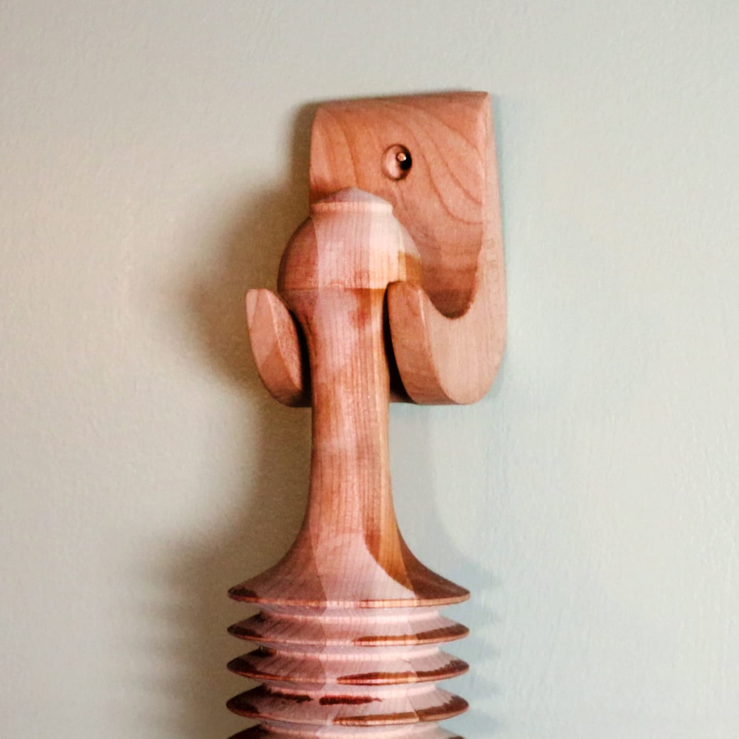 Unfinished cherry wood wall hook with sculpted elephant design for kitchenware and home organization collections