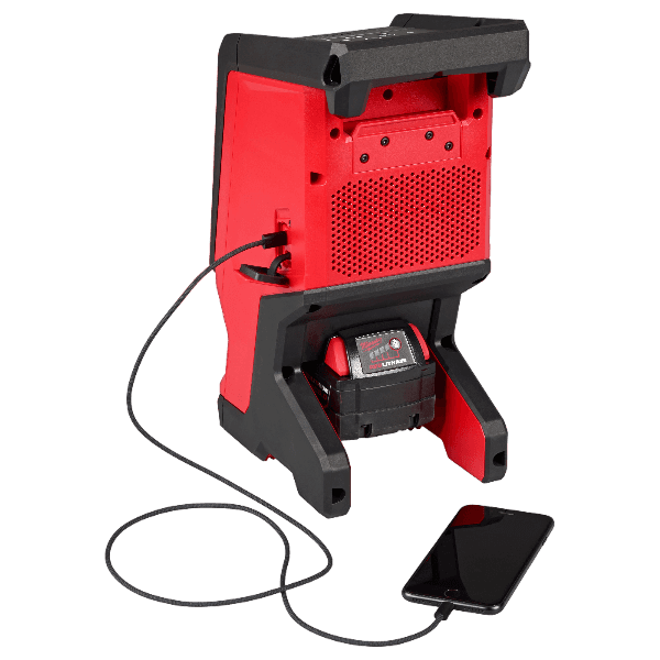 Red and black Bluetooth jobsite speaker with battery pack and smartphone connected for tools and home improvement use