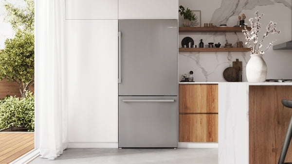Freestanding stainless steel bottom freezer refrigerator with anti-fingerprint finish in Bosch kitchen appliances collection