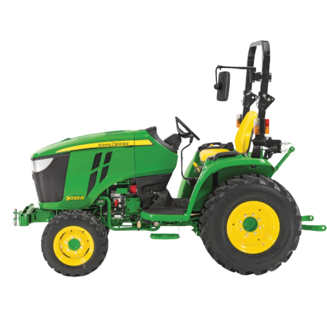 Green John Deere 3033R sub-compact tractor with yellow wheels, rollover protection, and open operator station, part of Outdoor Power Equipment at Hartville Hardware.
