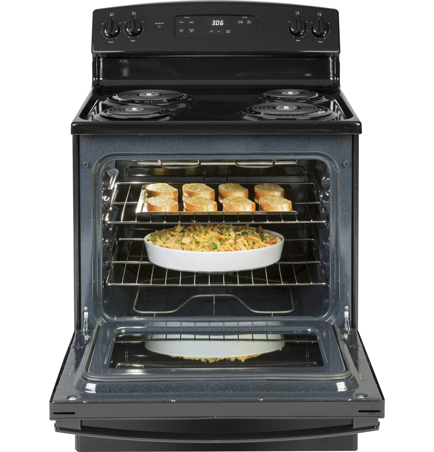 Black free-standing electric range with coil burners and open oven showing baked casserole and bread slices in Ranges collection