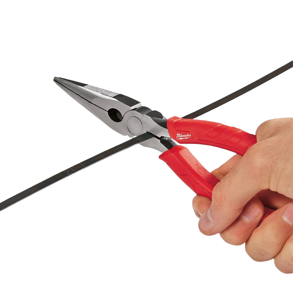 Hand gripping Milwaukee long nose pliers with red comfort grips cutting black cable for home improvement tasks