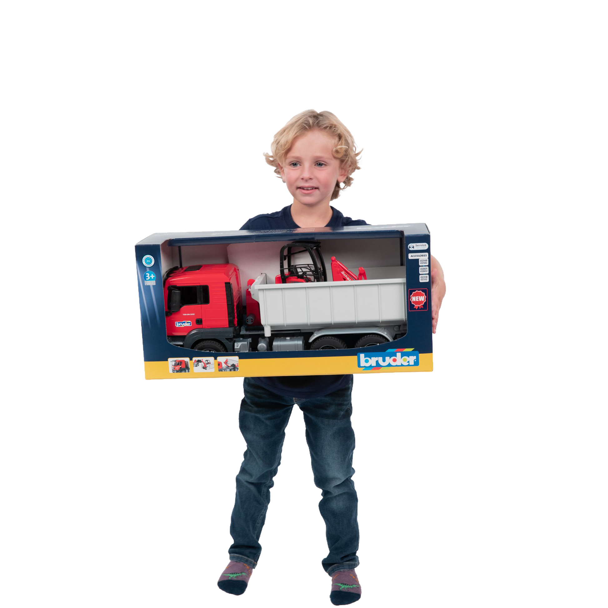 Child holding Bruder MAN TGS toy truck with roll-off container and compact loader in Vehicles & Remote Controlled Toys collection