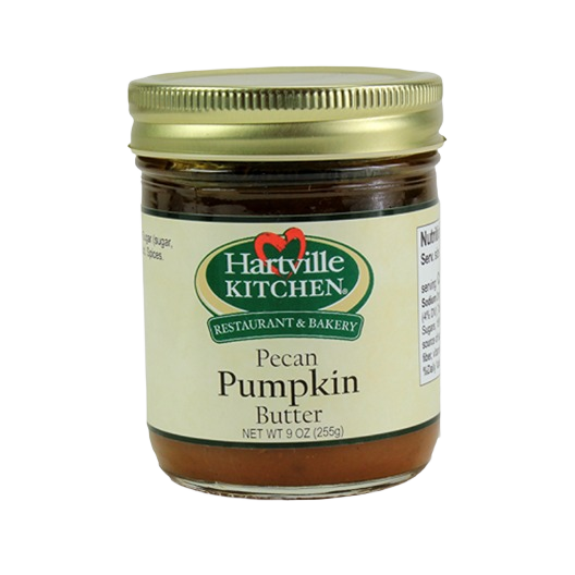 Glass jar of creamy pecan pumpkin butter with gold lid for Hartville Kitchen jams and jellies collection
