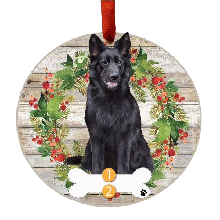 Round Christmas ornament featuring a black German Shepherd with a festive greenery and berry wreath background