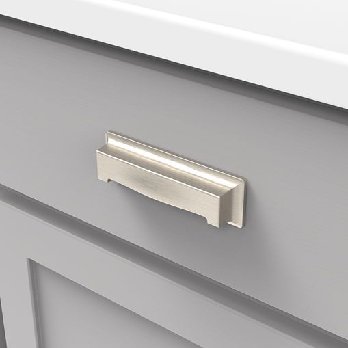 Satin nickel cup pull with classic curved design installed on gray cabinet for home improvement hardware accessory