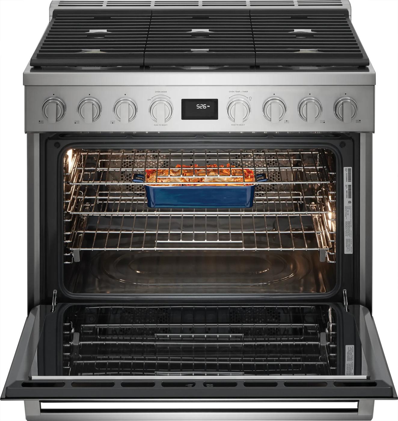 Stainless steel dual-fuel range with gas burners, digital display, open oven door, and dish baking inside for kitchen collections