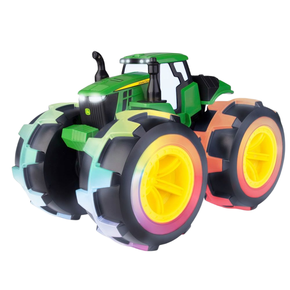 Green toy tractor with oversized rainbow-colored monster tread wheels designed for imaginative play