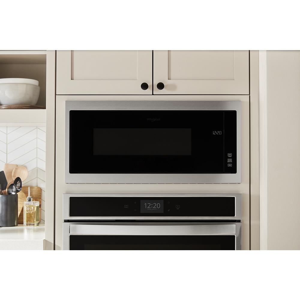 Built-in microwave with slim trim in modern kitchen cabinetry from Kitchen & Kitchenware and Appliances collections