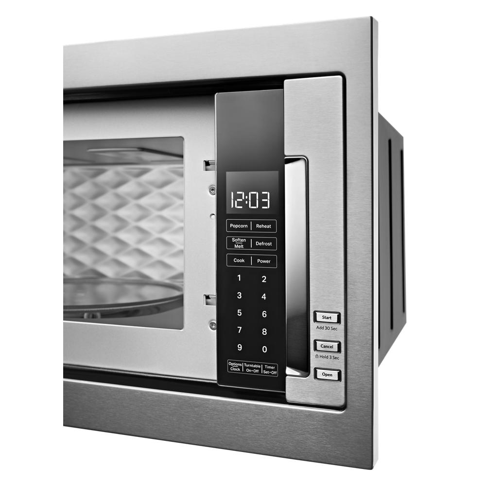 Built-in low profile microwave with digital control panel and sleek stainless steel finish from KitchenAid appliances collection
