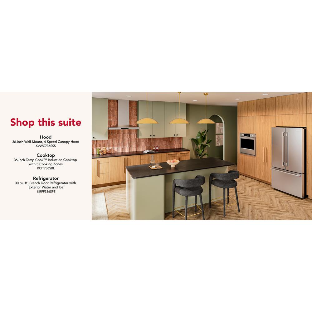 Contemporary kitchen with stainless steel appliances including wall-mount canopy hood and French door refrigerator
