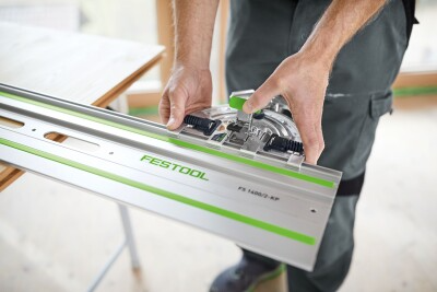 Adjusting an aluminum Festool guide rail with angle stop for precise cuts in woodworking and power tool accessories collections