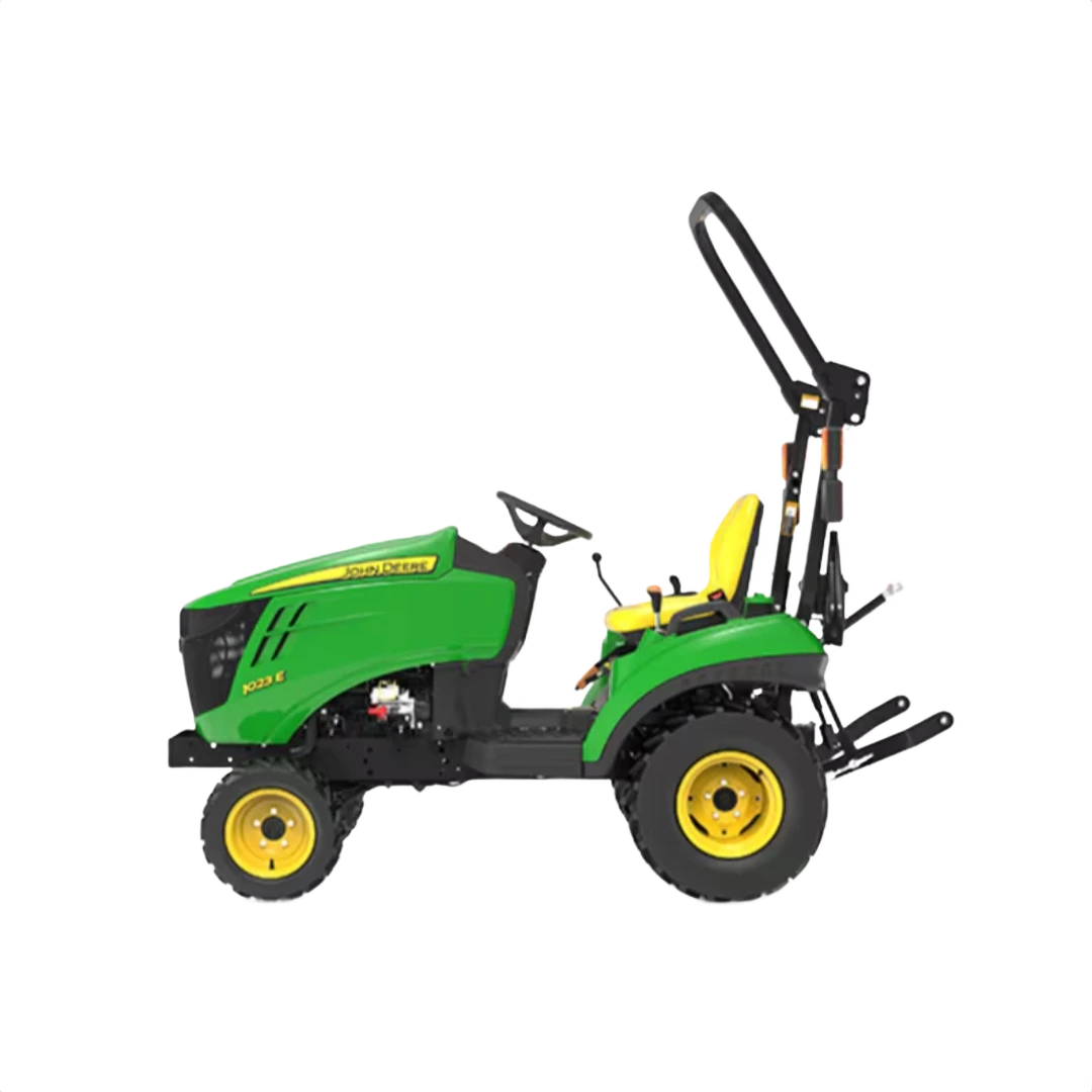 Green and yellow sub-compact utility tractor with roll bar and rear loader attachment for versatile home improvement tasks