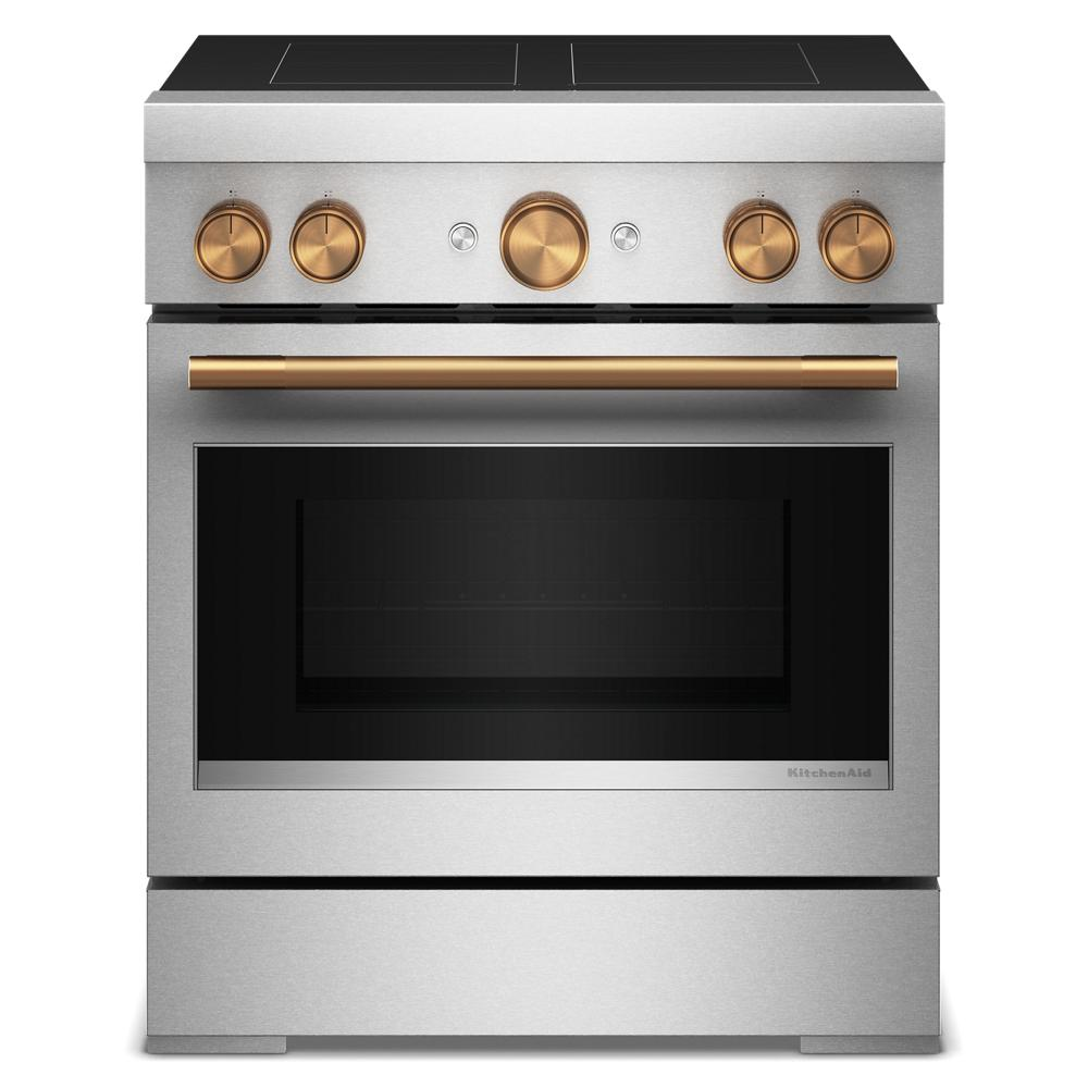 Freestanding stainless steel induction range with four elements, gold-tone knobs, and convection oven in kitchen appliances collection