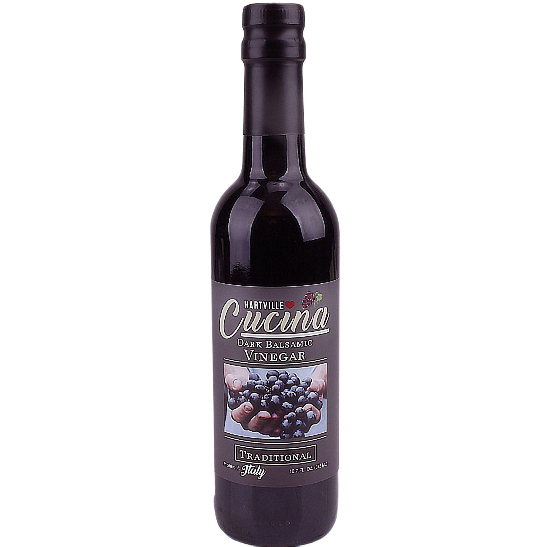 Bottle of traditional dark balsamic vinegar with Italian label for salad dressings and food collections
