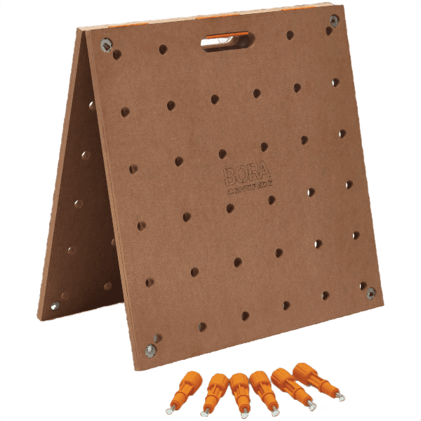 Portable brown workbench tabletop with pre-drilled holes and orange tool holders for home improvement tasks