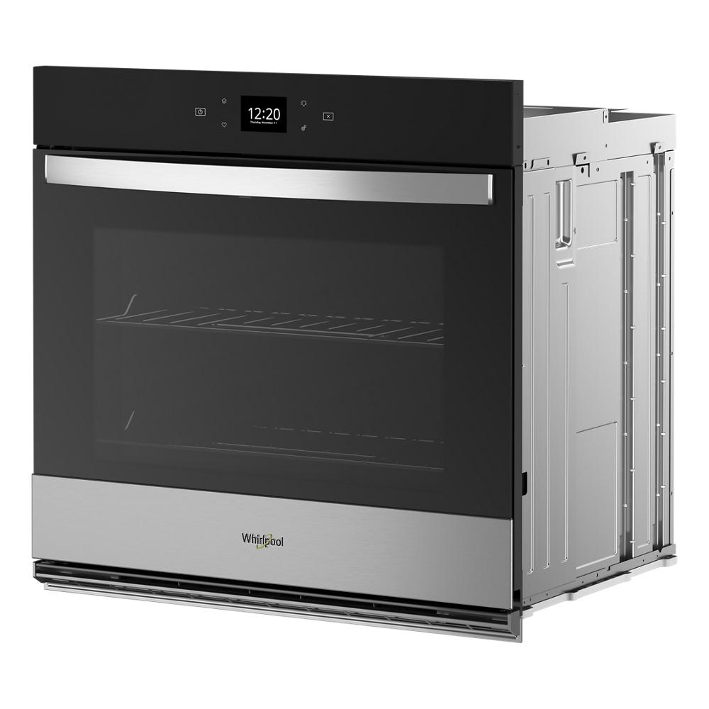 Black and stainless steel single wall oven with digital time display and large glass window in wall ovens and appliances collection