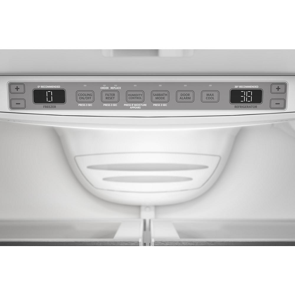 Control panel inside stainless steel French door refrigerator showing temperature settings and function buttons