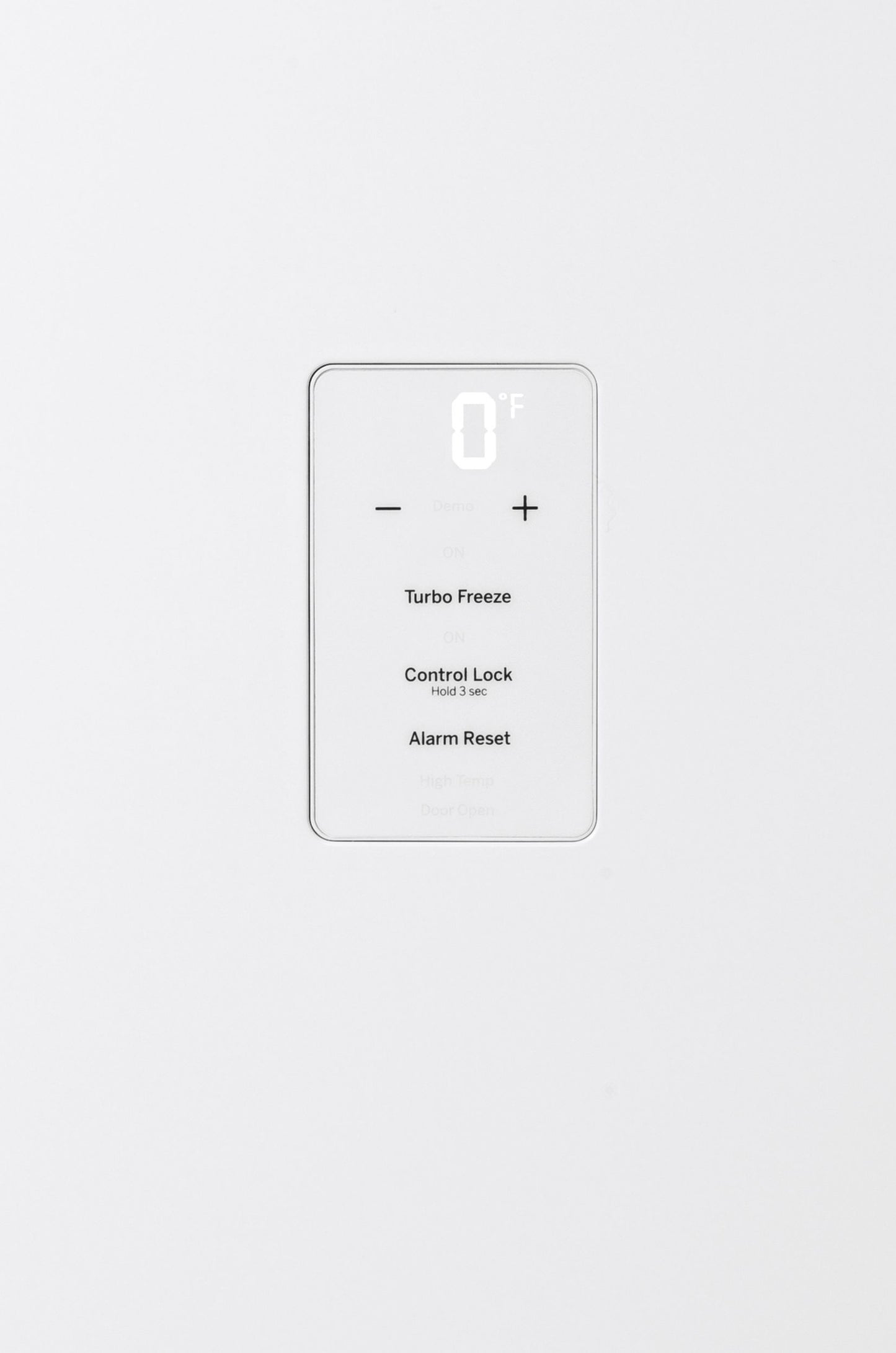 Digital control panel with temperature display and settings for turbo freeze, control lock, and alarm reset on white freezer