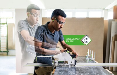 Man using Festool cordless track saw with kickback stop feature in workshop setting for home improvement tools